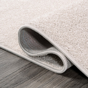 Haze Solid Low-pile Area Rug Ivory